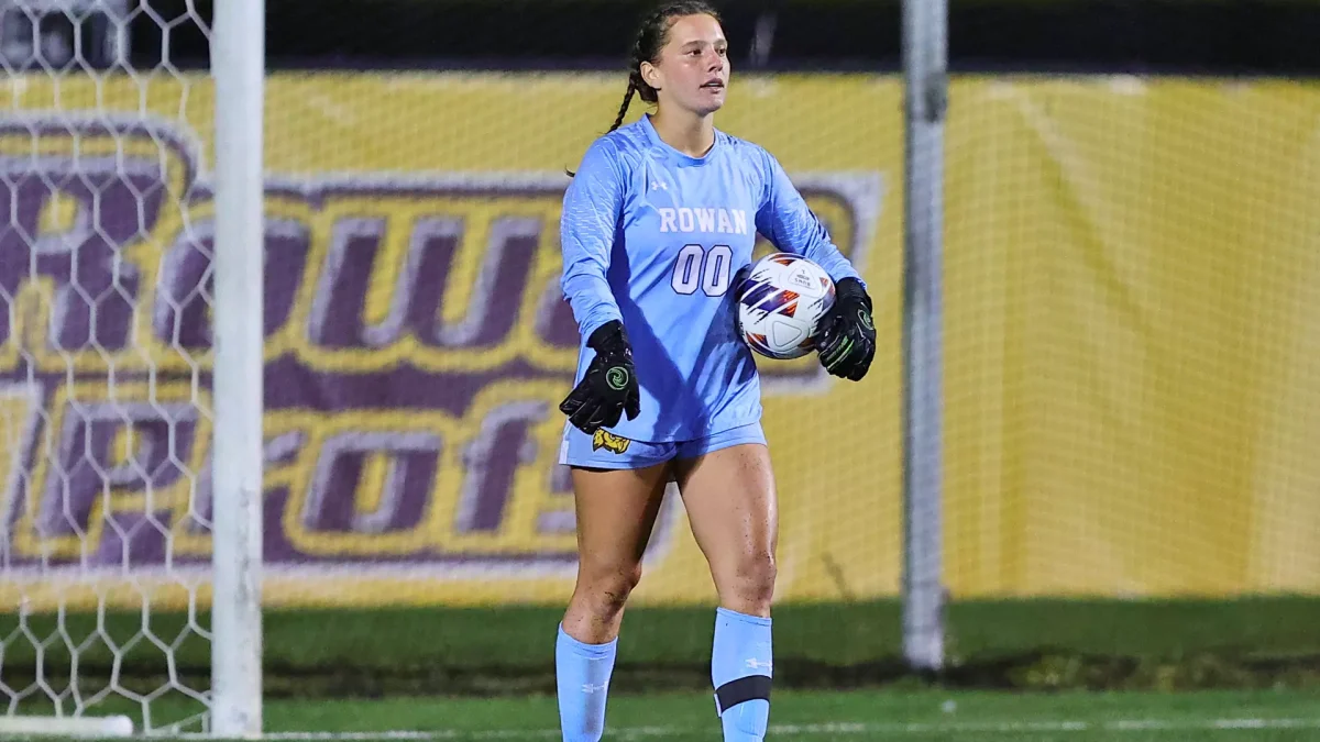 Calista Burke controls the net. The senior made six saves against TCNJ. - Photo via Rowan Athletics