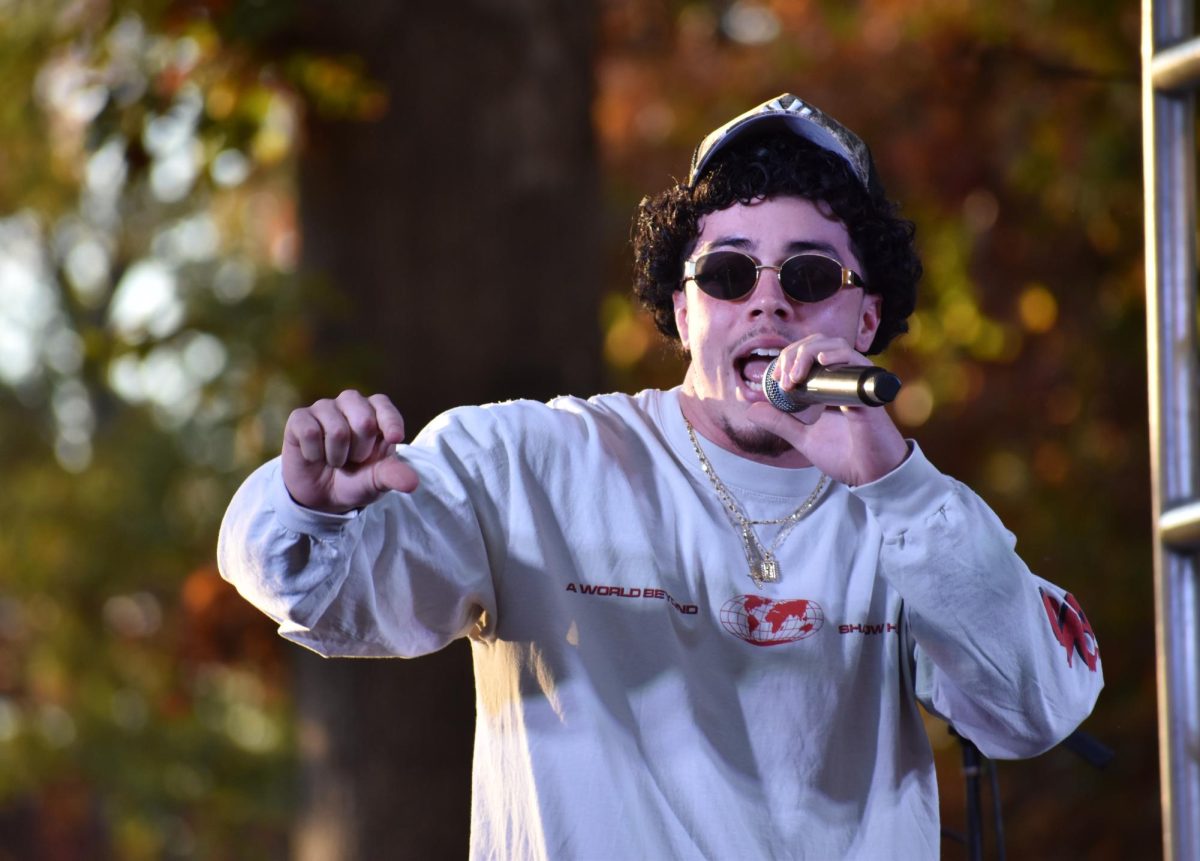 A student from Rowan's Hip Hop Club performs during the Homecoming Harvest Festival at Hollybush Green. - Staff Photographer / Owen Miller