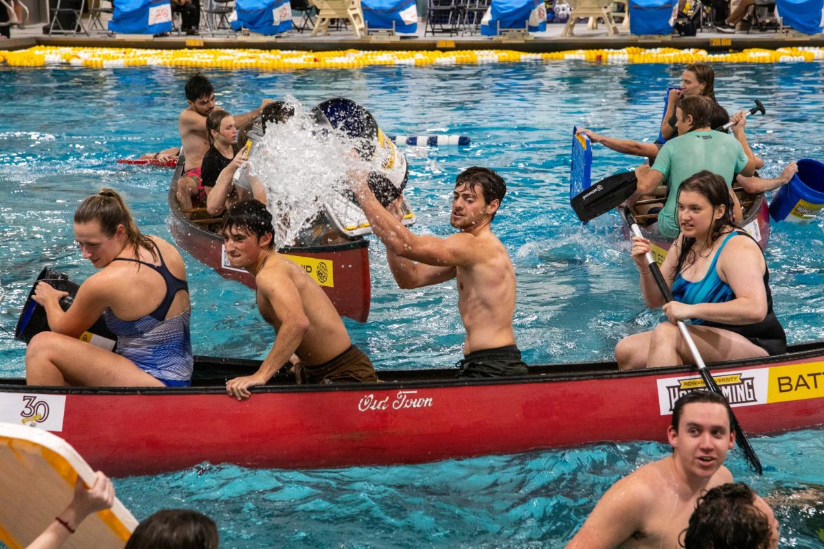 A battleship team launches water at another boat. - Photography Editor / Gavin Schweiger