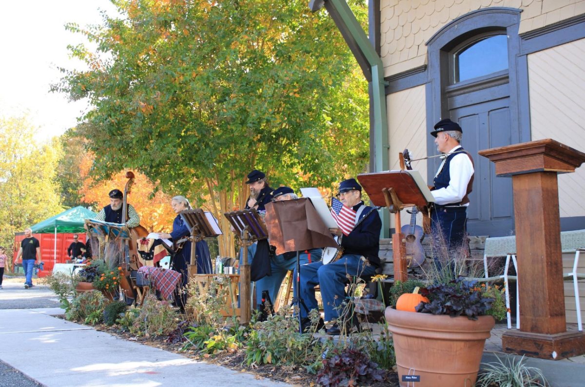 A live band plays music outside the West Jersey Train Depot. - Photo via @glassborohistoricalsociety on Facebook