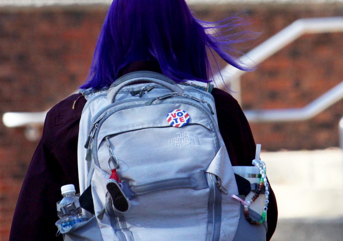 A voting pin on a students backpack. - Photo via Isaac Linsk