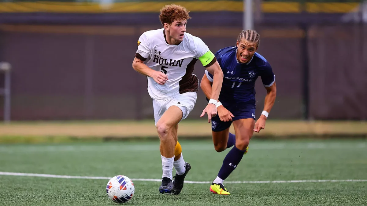 Ryan Cleary runs past a defender. Cleary scored the Profs lone goal. - Photo via Rowan Athletics