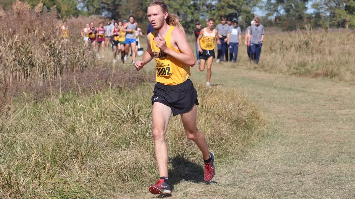 Miles Voenell approaches the finish line. The graduate student has been a standout for Rowan men's cross-country this season. - Photo via Rowan Athletics