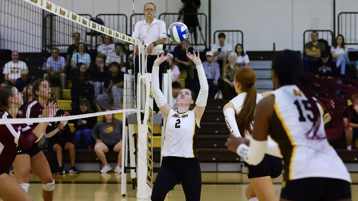 Brooke Adams sets up her teammate. The senior has played her last game as a Prof. - Photo via Rowan Athletics