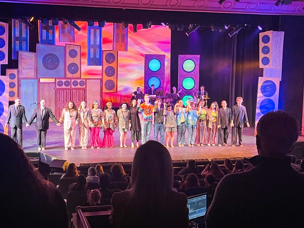 Rowan students standing ovation for "Come Together." - Staff Writer / Lily Miller