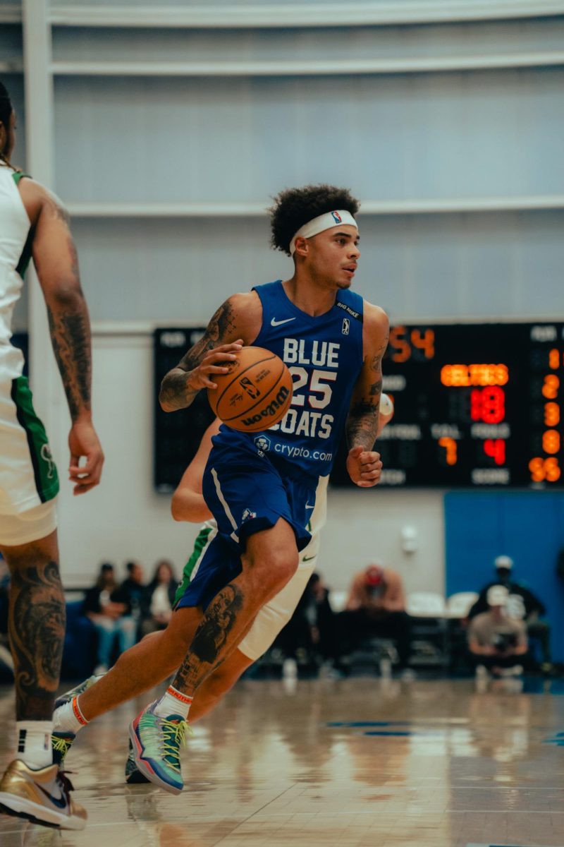 Lester Quinones drives to the basket. Quinones had a team-high 29 points in the win over the Knicks. Monday, Nov. 11, 2024. - Photo via Shamar Swann.