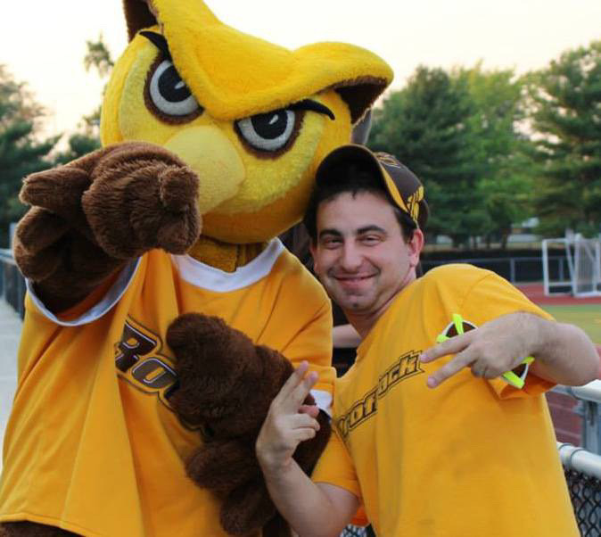 Noah Weinstein with Rowan's mascot. - Photo via @noahweinsteinrowan on Instagram