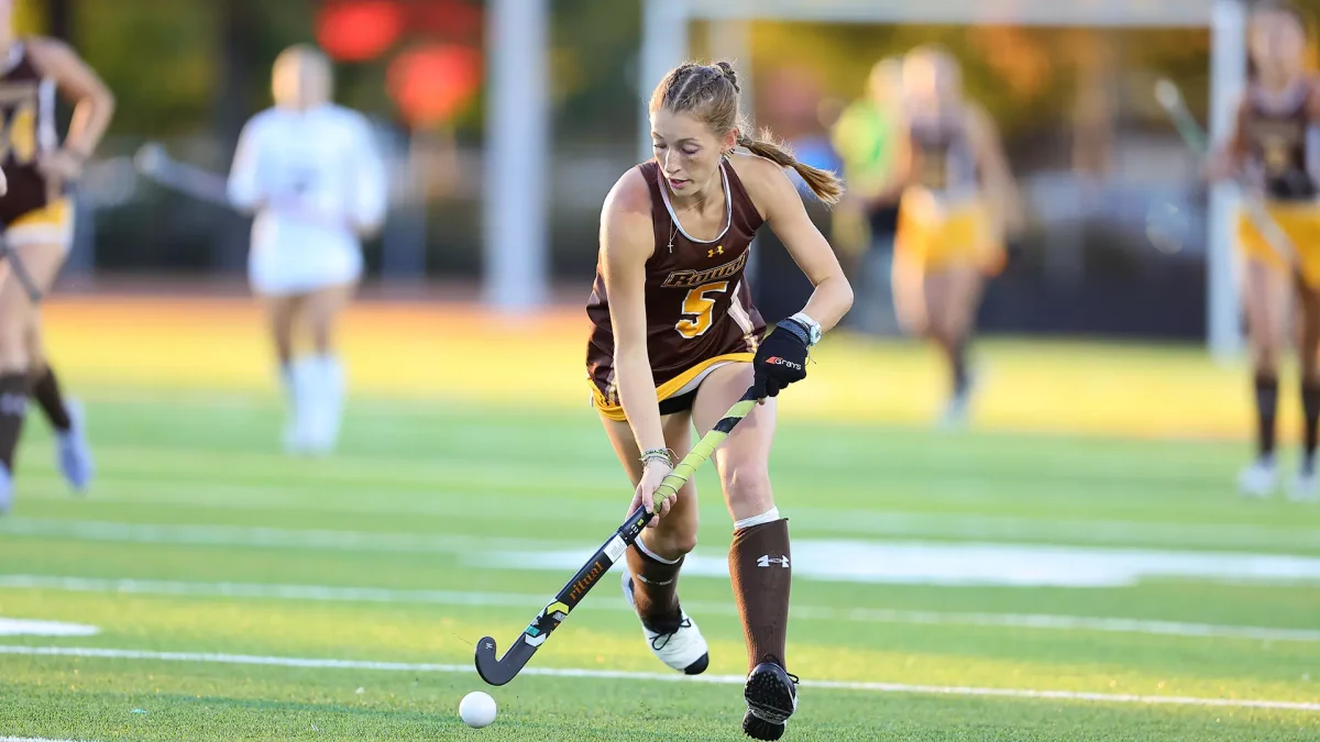 Kylie Elwell brings the ball up the field. Elwell is the president of The Hidden Opponent (THO). - Photo via Rowan Athletics