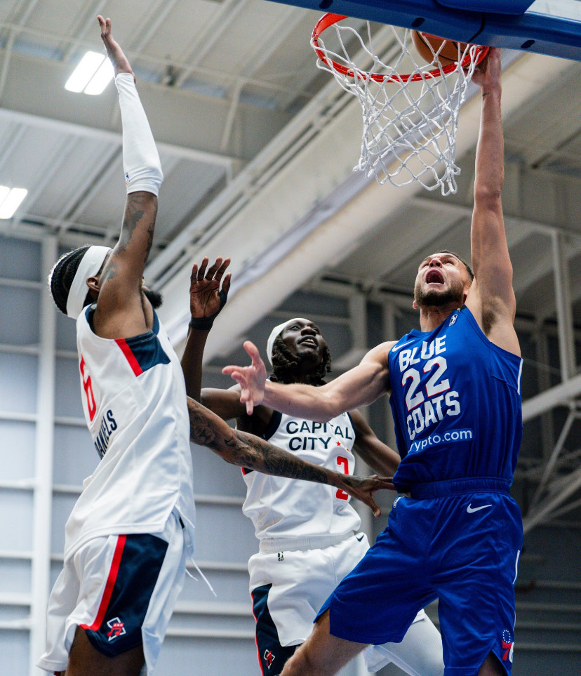 Pete Nance dunks the ball. Nance scored 15 points in his Blue Coats debut. - Photo via @blue_coats on X