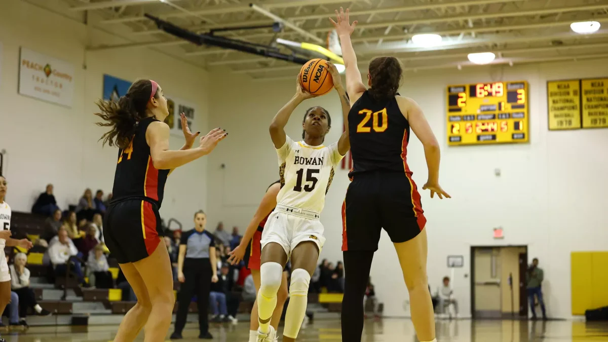 Charlotte Carlies rises up for a layup. Carlies has been instrumental for the team this year. - Photo via Rowan Athletics