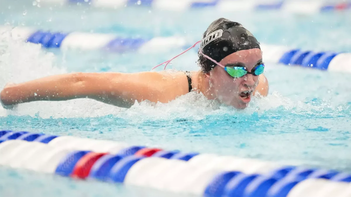 Ella Pennington competes in a race. The junior set a JHU pool record in the 200 backstroke on Dec. 6. - Photo via Rowan Athletics