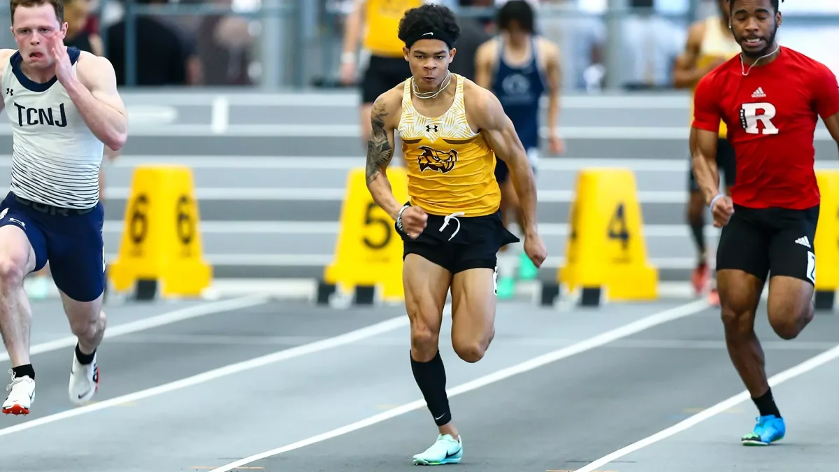 Masai Byrd sprints towards the finish line. The junior broke Shamar Love's school record in the 60-meter. - Photo via Rowan Athletics