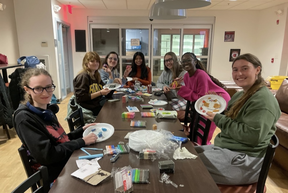 Students pose with their finished creations at the event. - Rachel Sampson / Staff Writer