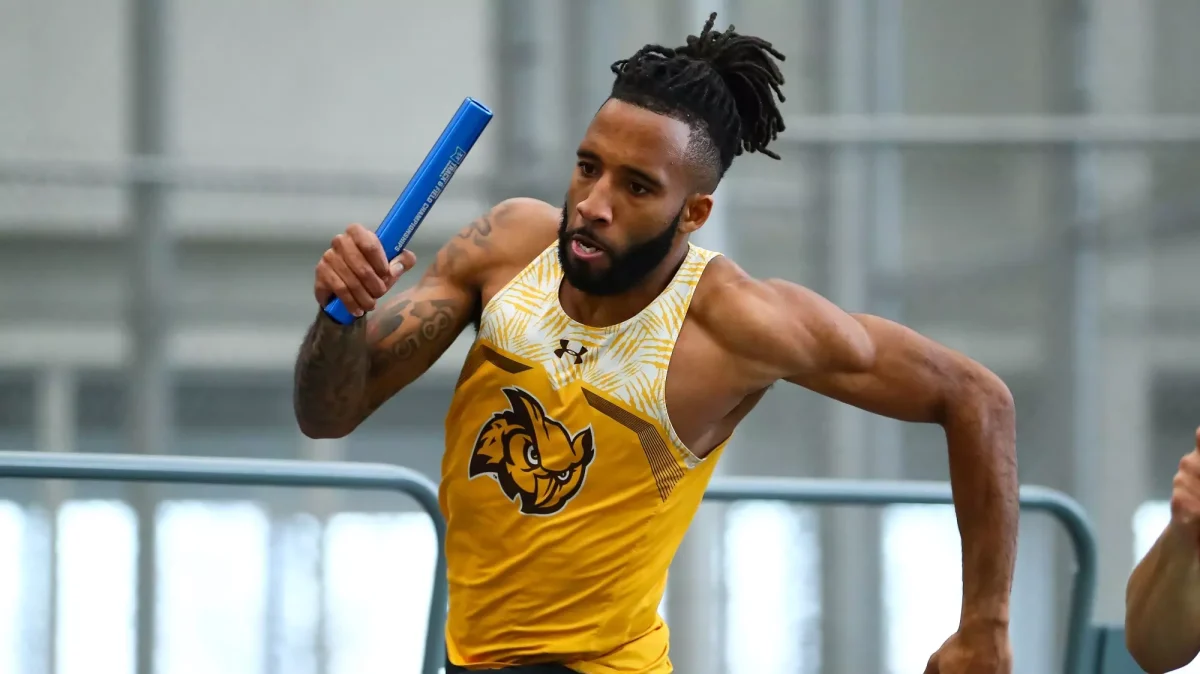 Marquise Young races towards the finish line. The fifth-year placed first in the 60-meter hurdles over the weekend. - Photo via Rowan Athletics