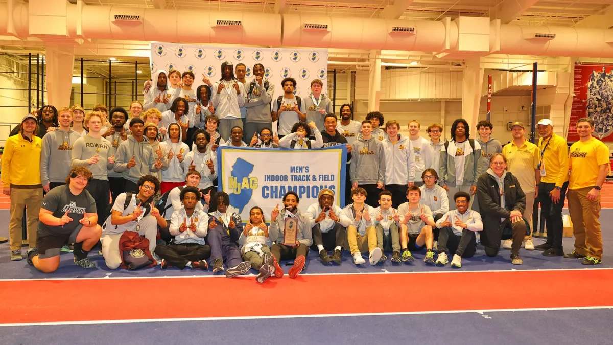 The team celebrates their New Jersey Athletic Conference Championship win. - Photo via Rowan Athletics