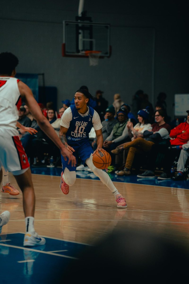 Judah Mintz drives to the basket. Mintz scored 36 points in the overtime win. - Photo via Shamar Swann