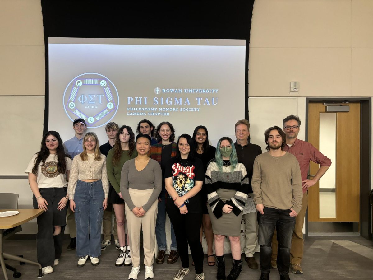 Students were inducted into the Philosophy Honor Society Lambda Chapter at the beginning of the meeting. - Photo via Ava Jackson