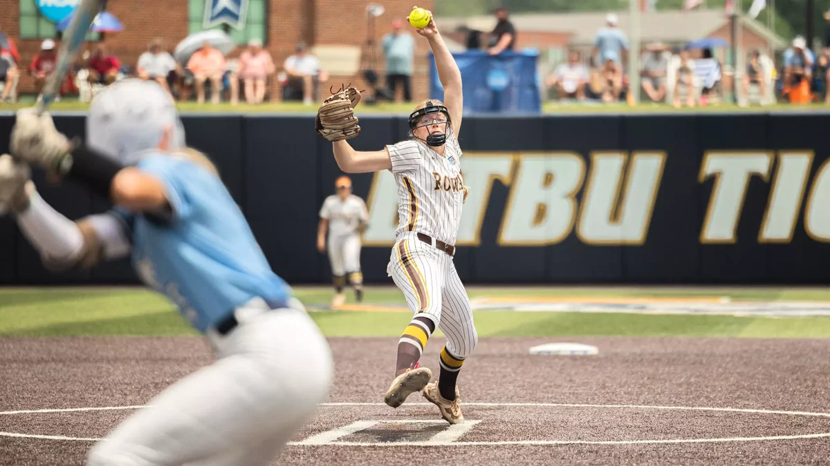 Emily McCutcheon winds up to throw the pitch. McCutcheon threw five shutout innings. - Photo via Rowan Athletics