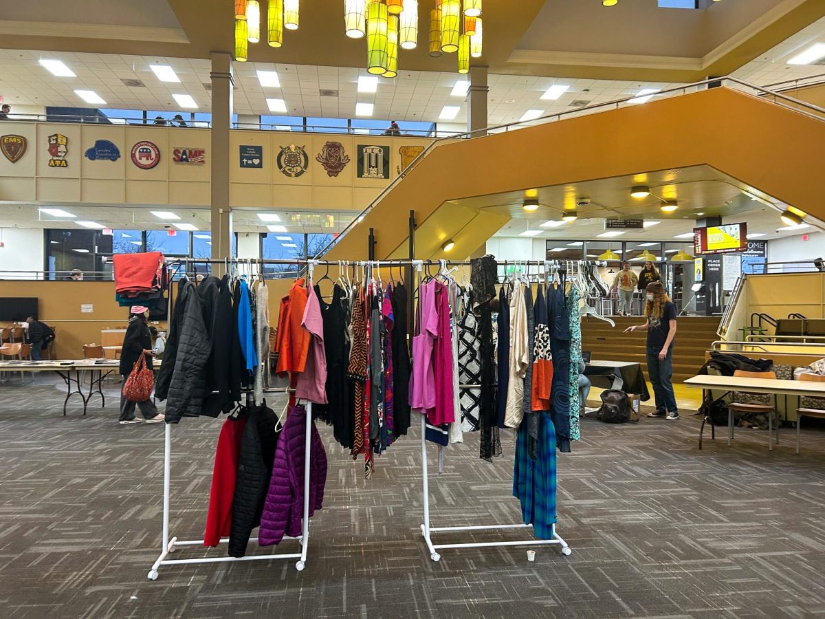 Students shop for clothes at the Prof Swap event hosted by the Rowan Environmental Action League (REAL) at the Student Center Pit. Glassboro, NJ. Wednesday, March 5, 2025. - Web Editor / Maryela Gallardo