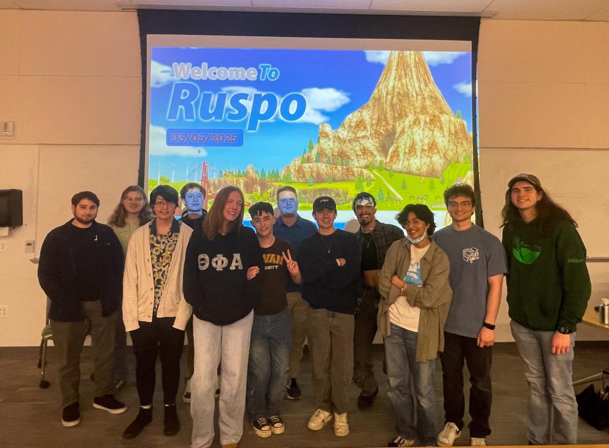 Members of the RUSPO club pose for a photo after a meeting. Glassboro, NJ. Wednesday, March 5, 2025. - Contributor / Alexander Cruz