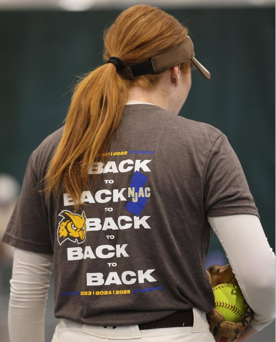 Pitcher BethAnne Doderer wears a shirt highlighting the program's third straight trip to the NCAA Division III Softball Championship during the team's pre-tournament practice at Illinois Wesleyan University. Bloomington, Ill. Wednesday, May 28, 2025. - Photo via @rowansoftball on Instagram