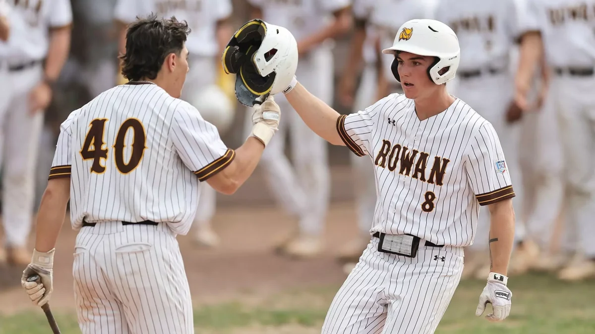 Jason Morgan crosses home plate. Morgan surpassed 200 career hits versus Ramapo. - Photo via Rowan Athletics