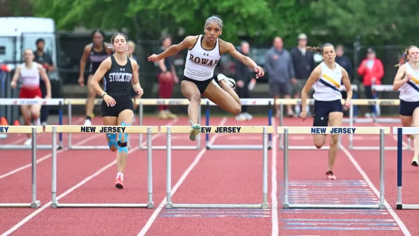 Nyla Jones competes in the hurdles. Jones set a new school record in the 400 meter hurdles during the NJAC championship weekend. - Photo via Rowan Athletics
