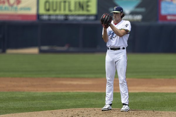 Jake Bennett stands on the mound. Bennett threw three scoreless innings on Saturday. - Photo via Ryan Griffith