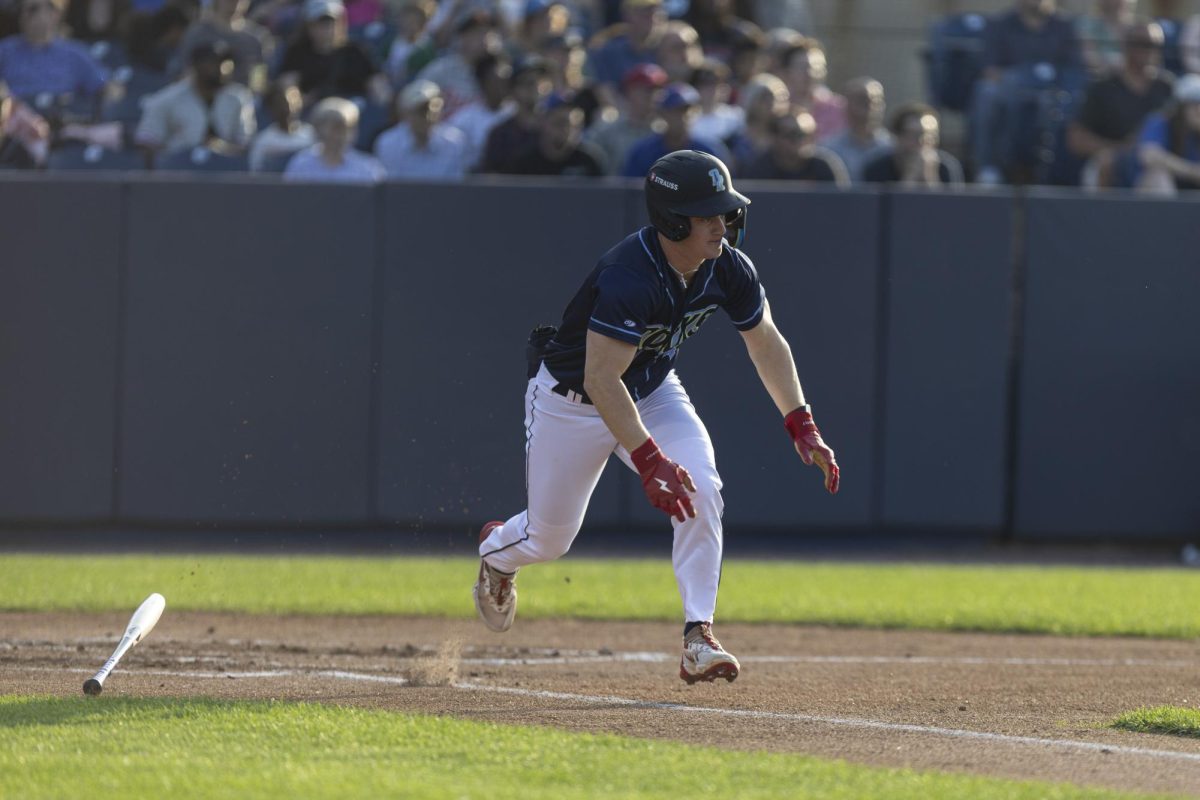 Sam Petersen hustles out of the batter's box. - Photo via Ryan Griffith