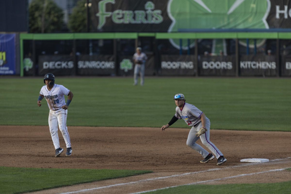 Caleb Lomavita leads off first. - Photo via Ryan Griffith