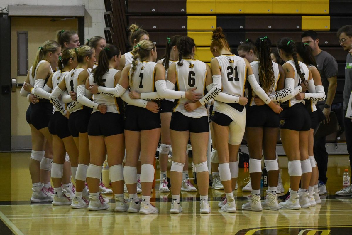 The women's volleyball team huddles up during a match against NJCU. Glassboro, NJ. Tuesday, November 5, 2024. 