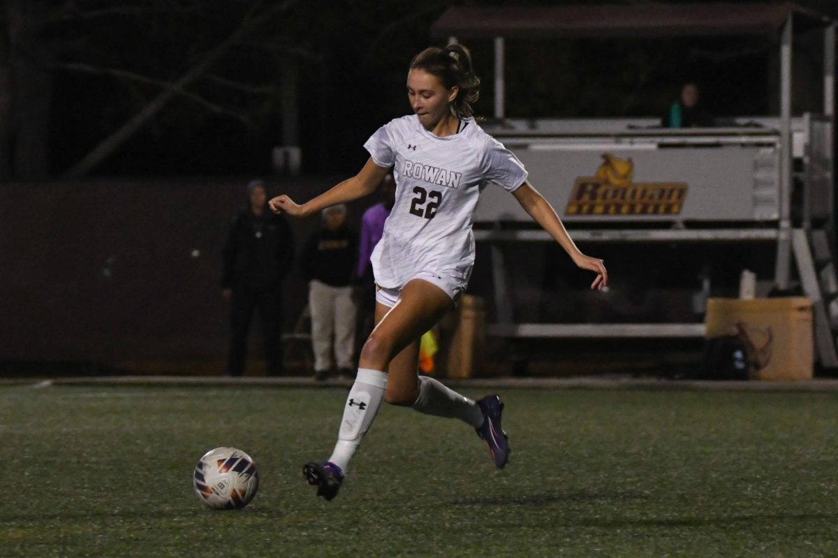 Cali Sloan kicks the ball. Sloan is a defender for the Profs. - Photo via Trevor Miceli