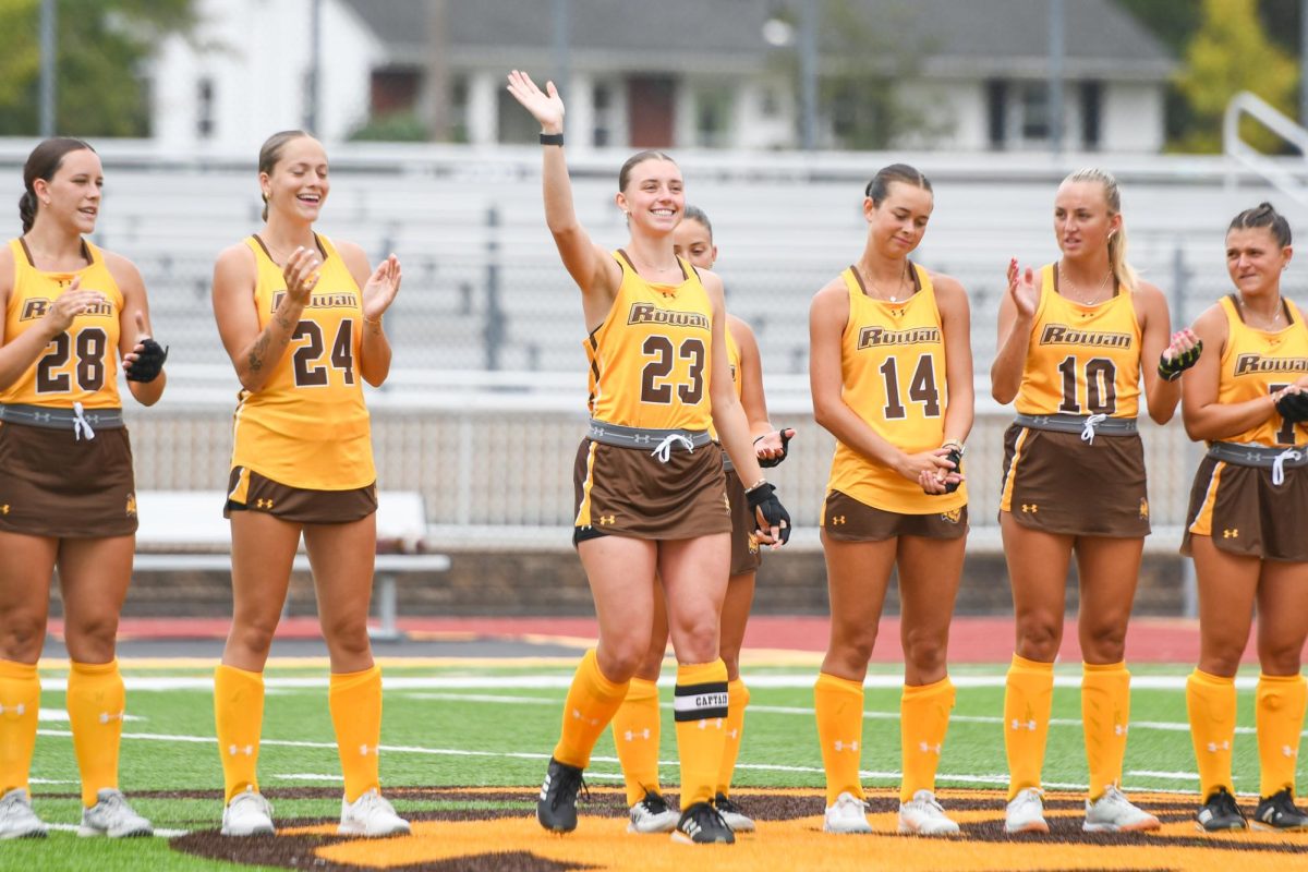 Tess Herman is introduced to the crowd at Coach Richard Wackar Stadium. Herman is one of the seniors on the field hockey team. (Contributor / Trevor Miceli)