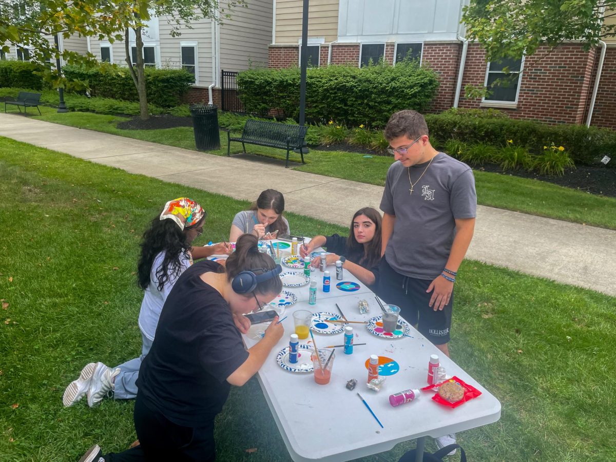 "I wanted to be more involved with the things happening around campus, so I decided to come here and get to do something,” said Salerno. (Graphics Editor / Alexander Cruz)