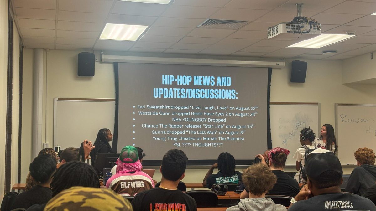 Students discuss the latest hip hop news at Hip Hop Culture Club’s first meeting of the semester in Wilson Hall. Thursday, Sept. 11, 2025. Glassboro, NJ. (Jaziya McDonald / Contributor)