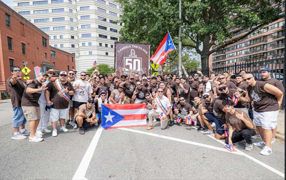 Lambda Theta Phi posed together for a group picture. (Nieves Creative Co.)