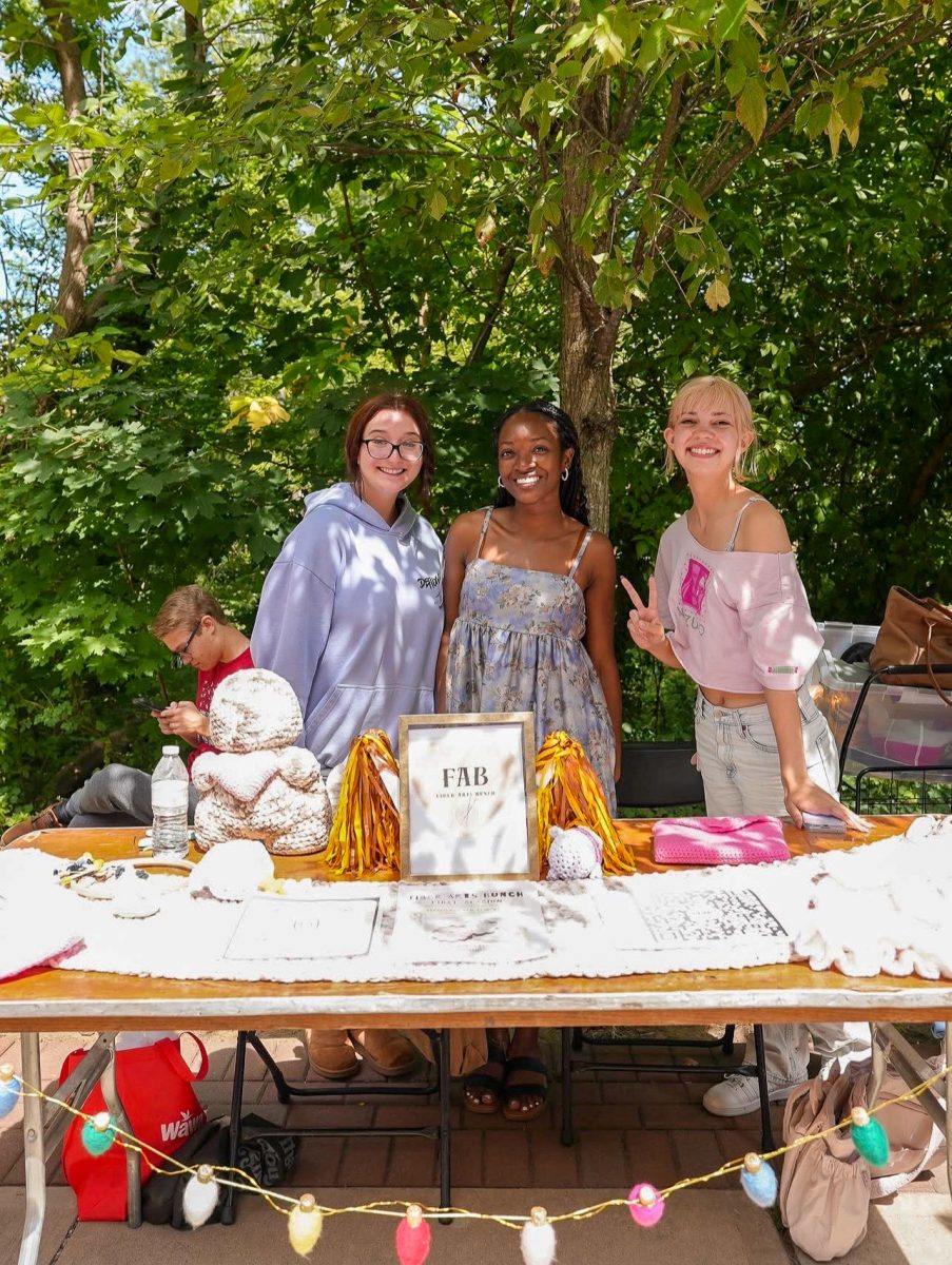 Members of the Fiber Arts Club at the fall 2025 org fair (Anna Willis)