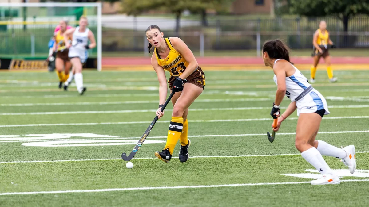 Tess Herman hits the ball. Herman scored two goals against Muhlenberg. (Rowan Athletics)