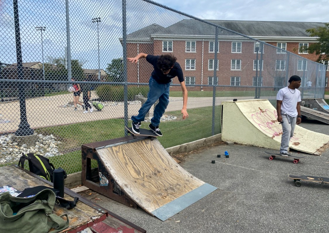 Christian Tantillo, a 19-year-old advertising and graphic design major, works on his landing on the quarter pipe. Glassboro, N.J. Saturday, Sept. 27, 2025. (Kacie Scibilia / Staff Writer).