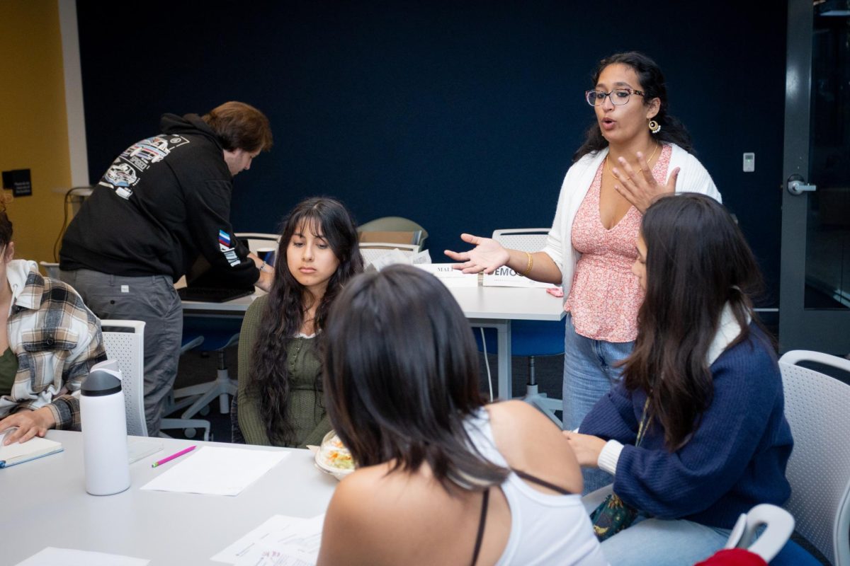 Anna Cherian, Model Diplomacy Organization club president, hosting the event. (Contributor / Will Mendez)