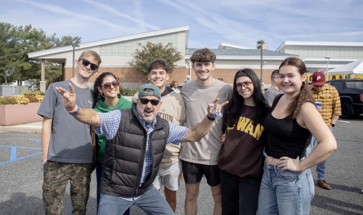 Tailgaters hang out outside Coach Richard Wackar Stadium. Glassboro, N.J. Saturday, Oct. 18, 2025. (Sports Photographer / Melanie Barahona)