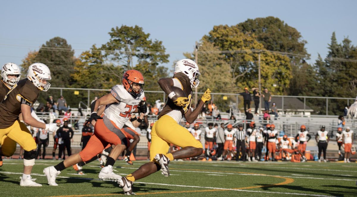 Mordecai Ford runs with the ball. Ford scored on a 94-yard touchdown run against William Paterson. Glassboro, N.J. Saturday, Oct. 18, 2025. (Sports Photographer / Melanie Barahona)