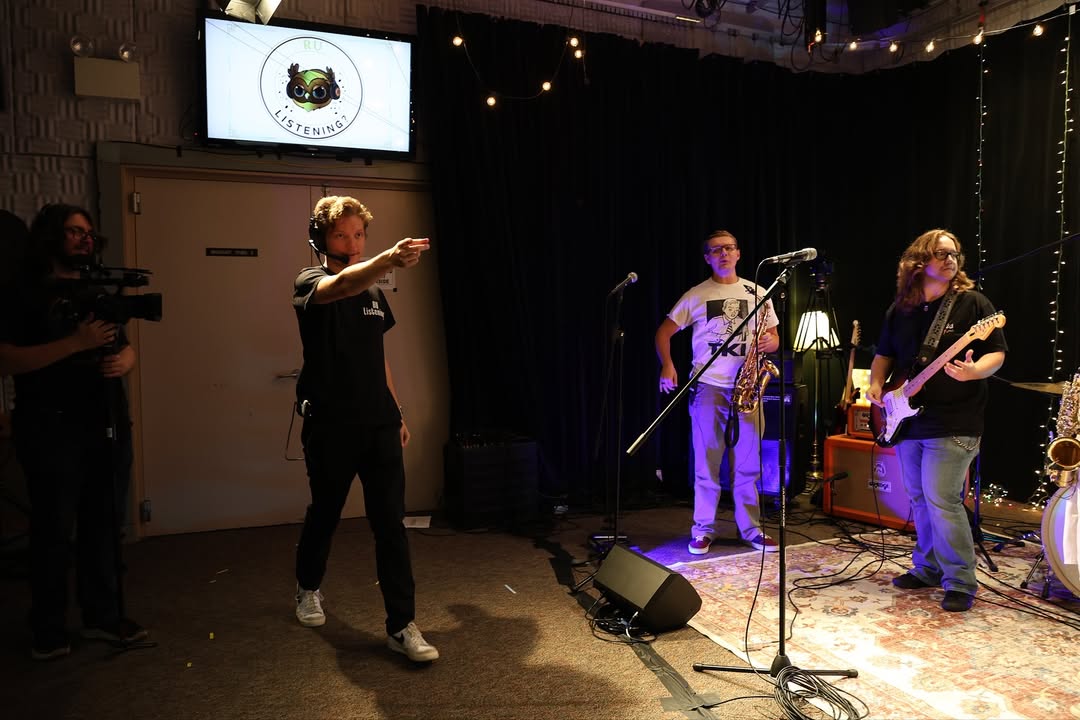 Adam Riem directs an episode of RU listening. (JP Freeman)