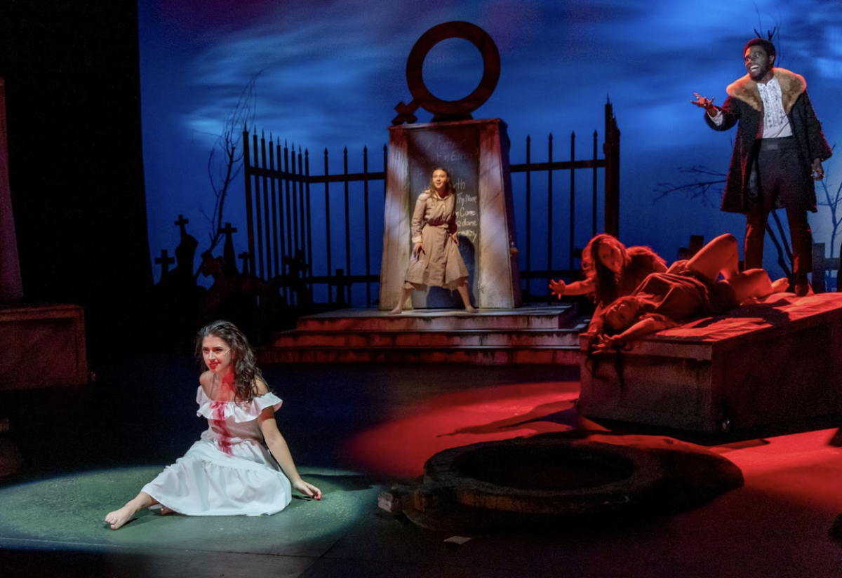 Carly Lane (Lucy Westenra), Mia Jeffery (Renfield), Sean Roberts (Drusilla), Anna Cate Hoffmann (Marilla), and Omari Williams (Dracula), perform in Rowan University’s production of “Dracula, a Feminist Revenge Fantasy, Really.” Dracula posesses Lucy Westenra with the help of Drusilla and Marilla. Tohill Theater. October 2025. (Kevin Monko) 
