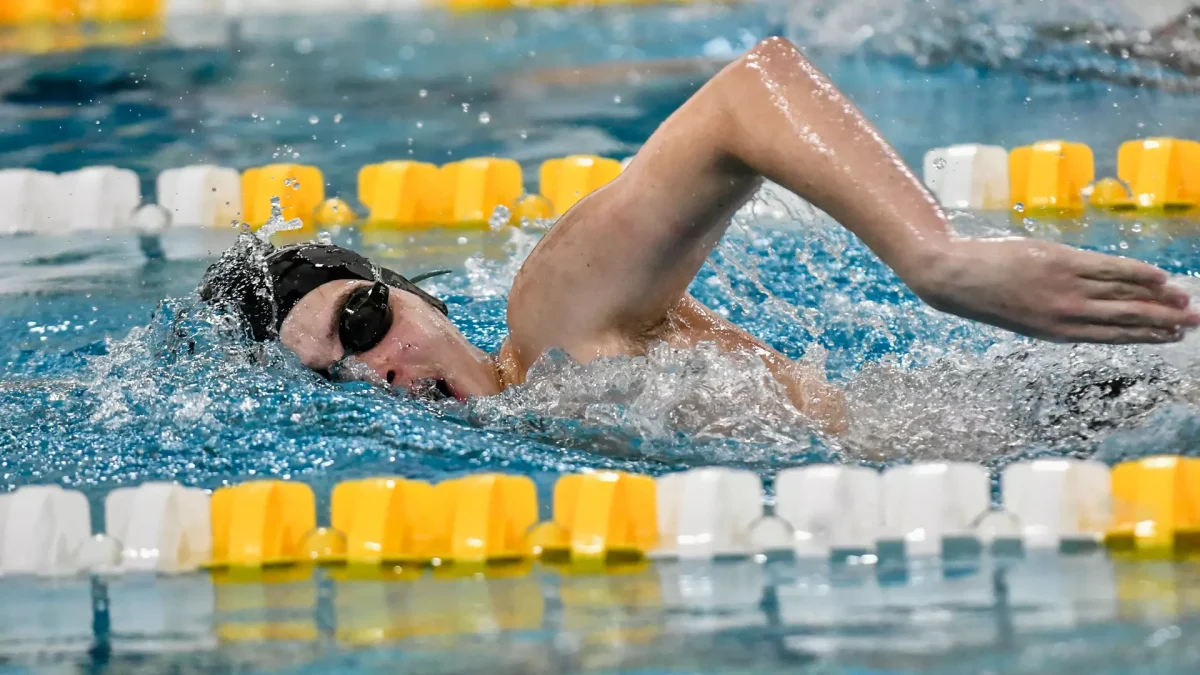 Gavin Danze competes in a race. Danze picked up wins in the 500 and 1000 free. (Rowan Athletics)
