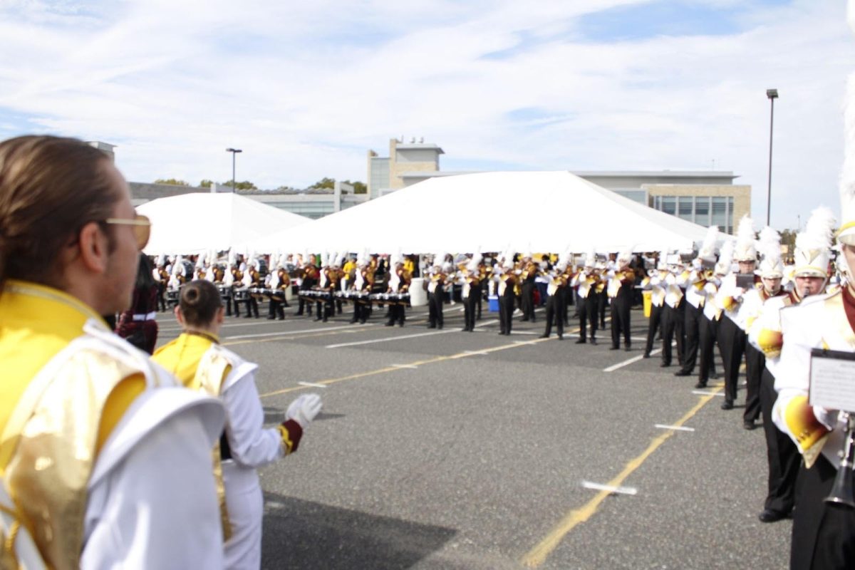 Rowan Marching band performing at the homecoming tailgate. (Staff Writer / Lucien Santoro)
