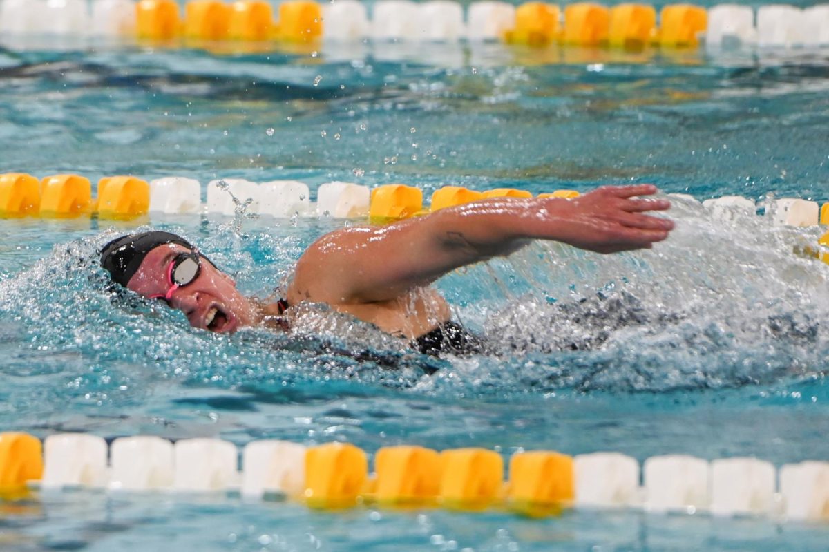 Ella Pennington swims the freestyle. Pennington broke the school record in the 200 free against Swarthmore. Glassboro, N.J. Friday, Dec. 5, 2025. (Sports Photographer / Trevor Miceli)