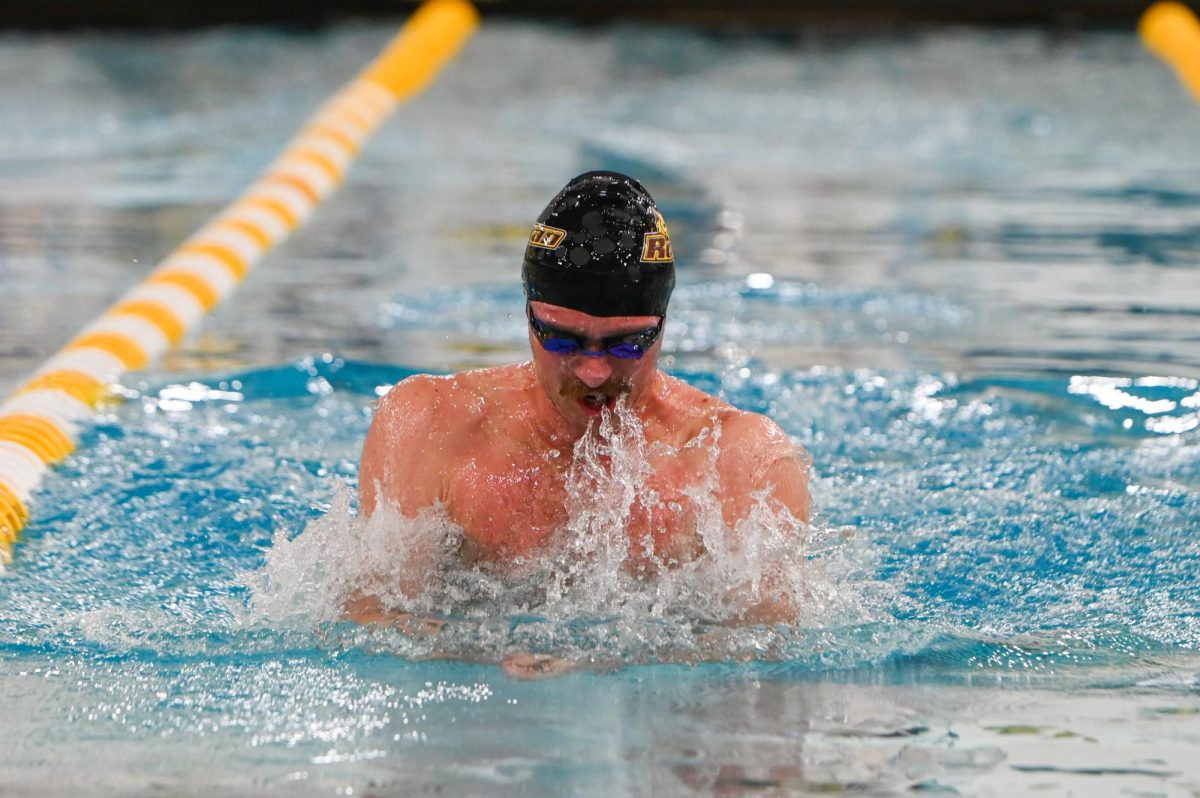 Michael O'leary swims the breaststroke. Glassboro, N.J. Wednesday, Dec. 10, 2025. (Sports Photographer / Trevor Miceli)