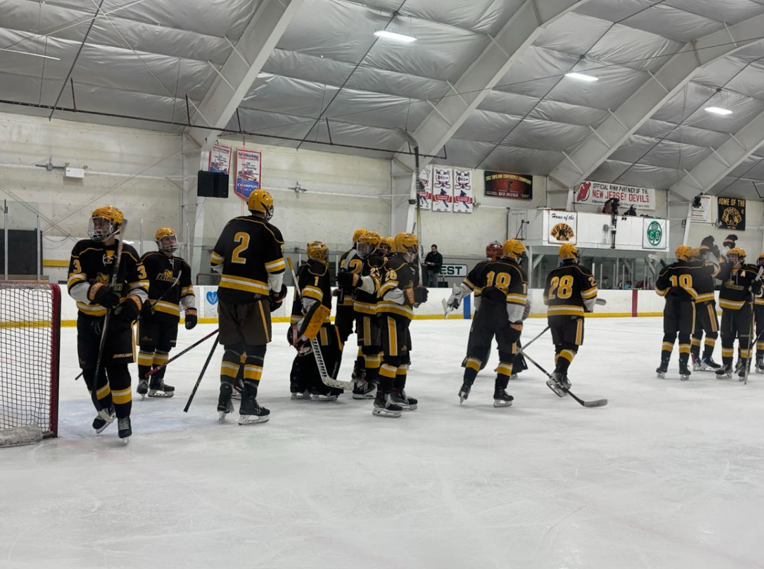 Rowan celebrates the win. Flemington, N.J. Friday, Nov. 22, 2025. (Staff Writer /  Eric Czerwonka)