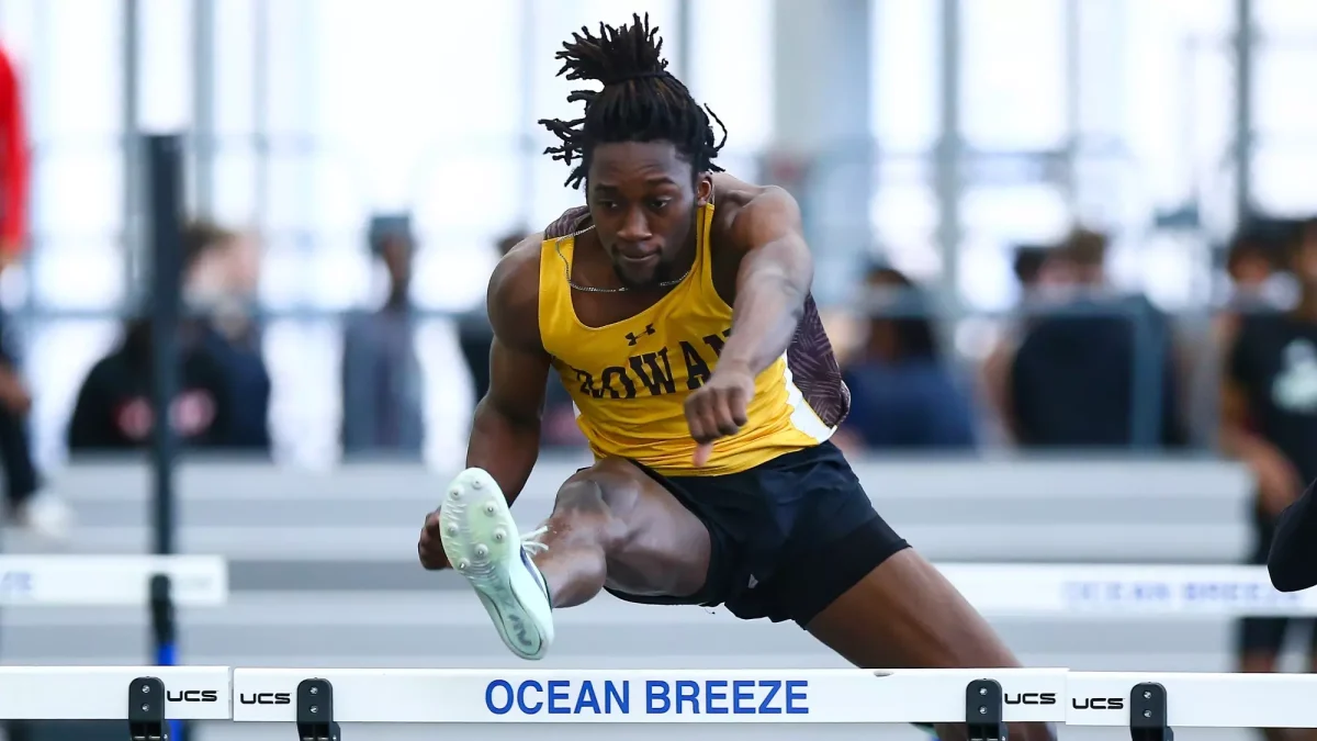 Jason Agyemang competes in the hurdles. Agyemang finished second in the 60 meter hurdles. (Rowan Athletics)